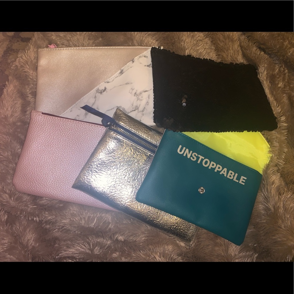 5 new make up bags.